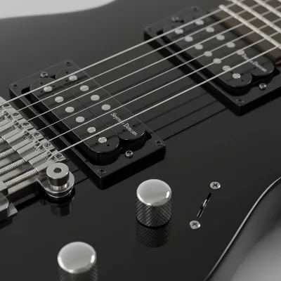 Close-up shot of Seymour Duncan humbucker pickups on a Jackson Soloist electric guitar, highlighting their detailed construction and placement, with a blurred guitar body in the background.